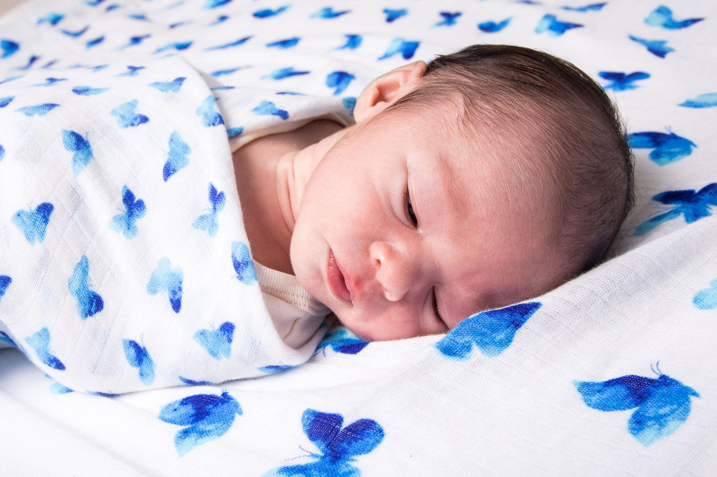 ORGANIC SWADDLE - BLUE BUTTERFLY